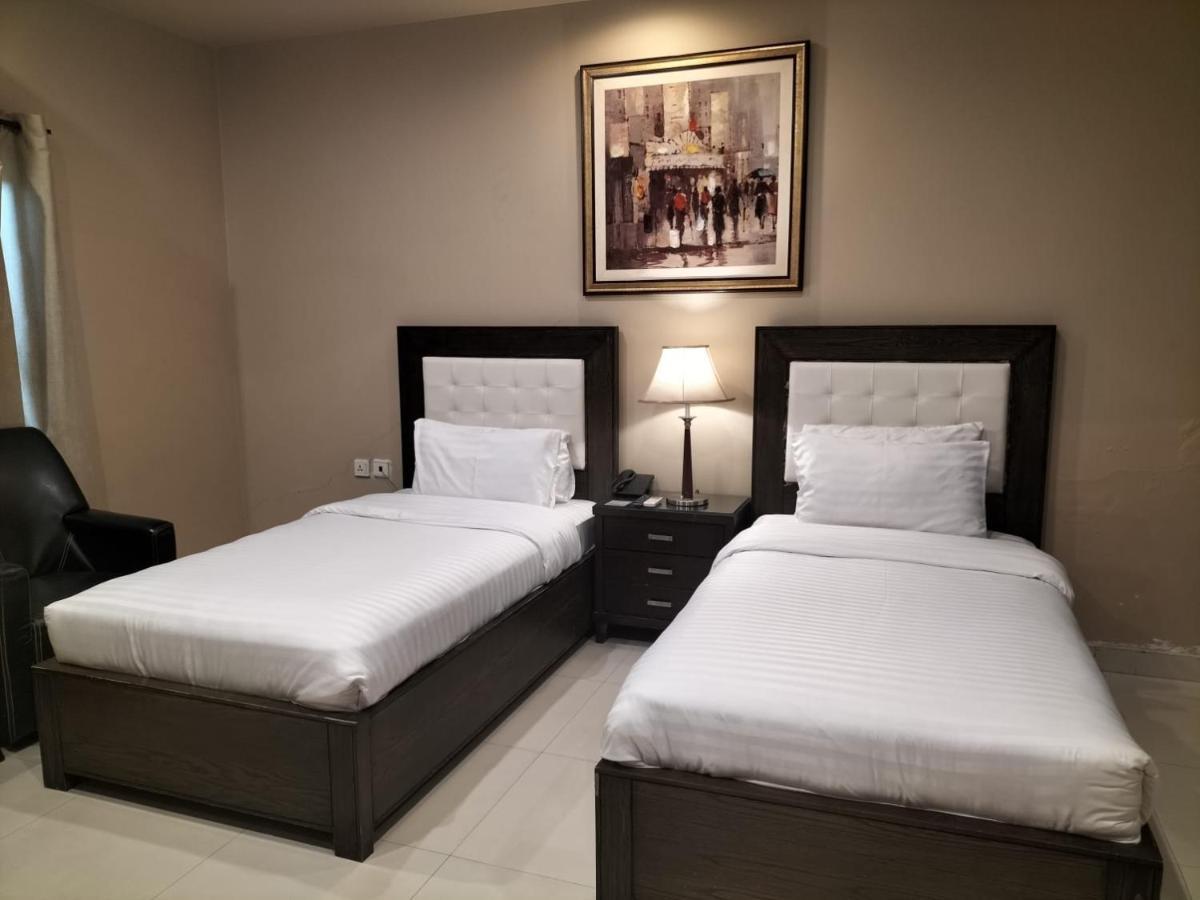 Grand Regent Hotel And Suites ไฟซาลาบัด ภายนอก รูปภาพ